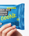 Metallic Snack Pack in a Hand Mockup