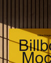 Billboard on a Wall with Wooden Slats Mockup