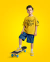 Boy Wearing T-Shirt and Cargo Shorts with Skateboard Mockup