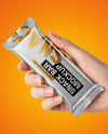 Metallic Snack Bar in a Hand Mockup