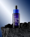 Amber Dropper Bottle on the Rock Mockup