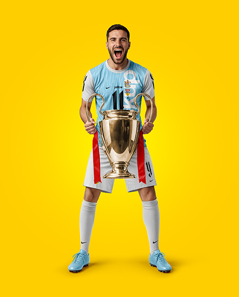 Man Wearing Soccer Jersey and Shorts Holds Cup Mockup