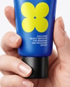 Matte Cosmetic Tube in a Hand Mockup