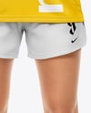 Woman Wearing Soccer Jersey and Shorts Mockup