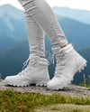 Pair of Hiking Boots on Woman's Legs with Jeans Mockup