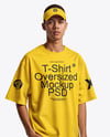 Man Wearing Oversized T-Shirt and Sun Visor Mockup