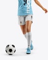 Female Soccer Player Wearing Jersey and Shorts Mockup
