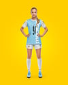 Woman Wearing Soccer Jersey and Shorts Mockup