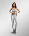 Woman Wearing a Crop Top and Leggings Mockup