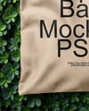 Tote Bag on a Green Leafy Background Mockup