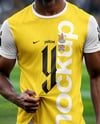 Soccer Player Wearing a Crew Neck Jersey and Shorts at the Stadium Mockup