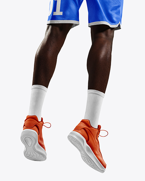 Basketball Player Wearing Jersey and Shorts Throwing Basketball Mockup