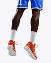 Basketball Player Wearing Jersey and Shorts Throwing Basketball Mockup