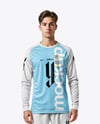 Man Wearing Long Sleeve Raglan Soccer Jersey and Shorts Mockup