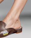 Pair of Leather Mules on Woman's Legs Mockup