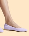 Pair of Suede Ballet Flats on Woman's Legs Mockup