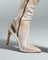 Pair of Over-The-Knee Boots on Women's Legs with Skirt Mockup