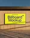 Billboard on a Wall with Wooden Slats Mockup