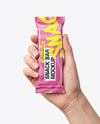 Matte Snack Bar in a Hand Mockup