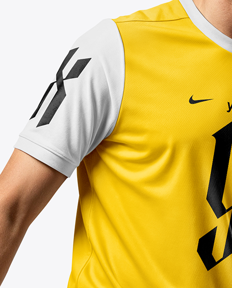 Man Wearing Soccer Jersey and Shorts Mockup