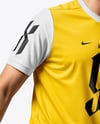 Man Wearing Soccer Jersey and Shorts Mockup