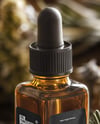 Amber Dropper Bottle with Oil Tincture Mockup