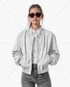 Woman in Sunglasses Wearing Bomber Jacket and Jeans Mockup