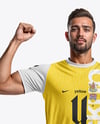 Man Wearing Soccer Jersey and Shorts Mockup
