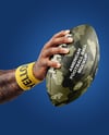 American Football Ball in a Hand Mockup