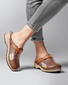Pair of Clogs on Woman's Legs with Jeans Mockup