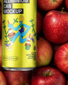 16oz Drink Can on a Stack of Red Apples Mockup