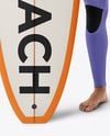 Surfer Wearing Wetsuit with Longboard Mockup
