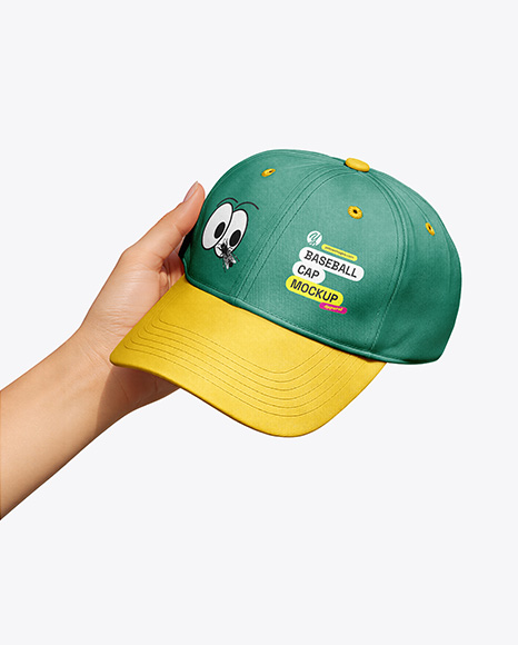 Baseball Cap in a Hand Mockup - Hand holding product mockup