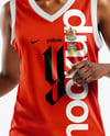 Woman Wearing Full Basketball Uniform and Holding Ball Mockup