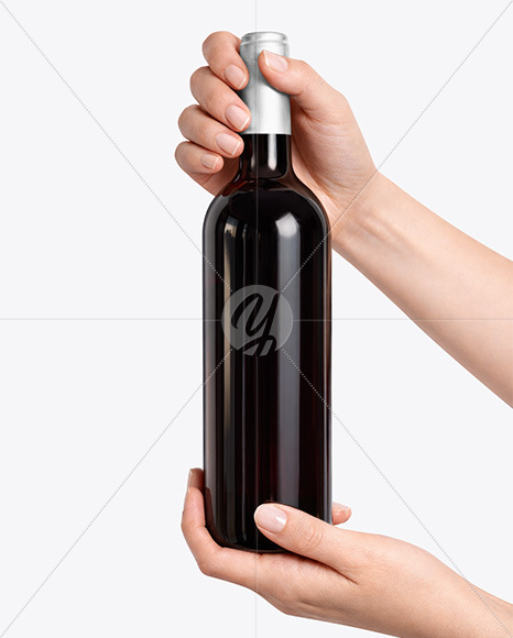 Red Wine Bottle in Hands Mockup