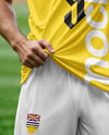 Soccer Player Wearing a Full Kit at the Stadium Mockup