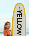 Woman Wearing Bodysuit Holding Surfboard Mockup