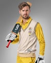 Cricket Player Wearing a Sleeveless Jumper Holding a Bat Mockup