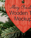 Wooden Heart Shaped Toy on Christmas Tree Mockup