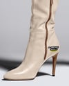 Pair of High-Knee Boots on Women's Legs with Dress Mockup