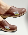 Pair of Clogs on Woman's Legs Mockup