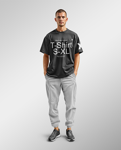 Man Wearing an Oversize T-shirt and Pants Mockup