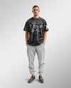 Man Wearing an Oversize T-shirt and Pants Mockup