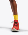Black Female UFC Fighter Wearing T-Shirt & Shorts Mockup