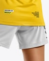 Female Soccer Player Wearing Jersey and Shorts Mockup