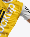 Man Wearing Soccer Jersey and Shorts Mockup