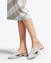 Pair of Suede Mules on Woman's Legs Mockup
