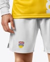 Man Wearing Long Sleeve Raglan Soccer Jersey and Shorts Mockup