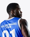 Basketball Player Wearing Jersey and Shorts with Basketball Mockup