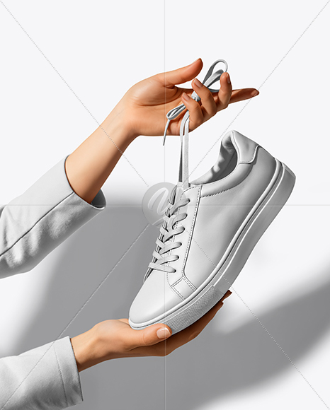 Woman's Hands Holding Sneaker Mockup